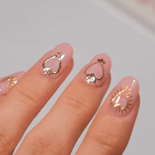 Nail artist foxicure with gold heart manicure gel polish stickers MoYou London