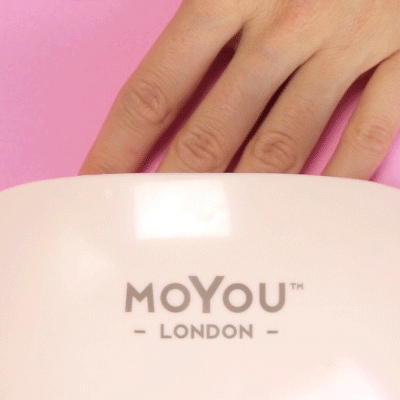 Curing the Gel Nail Strip manicure with the UV Lamp