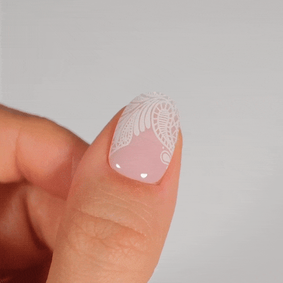 Nail artist paiwaloves white lace manicure using gel polish stickers for strong nails