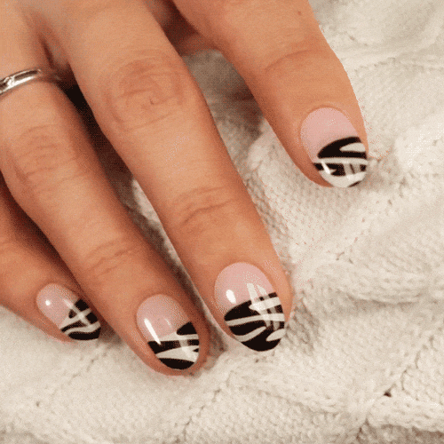 French manicure with zebra tips using gel polish stickers for healthy and strong nails