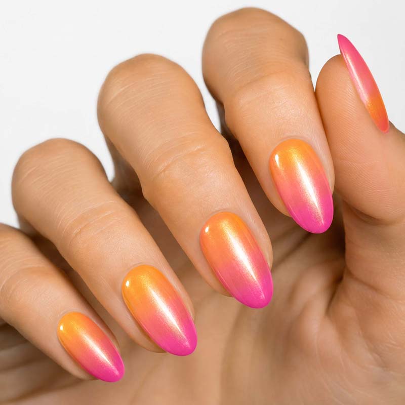 How to make press-on nails last longer featuring MoYou London coral and pink gel press-on nail designs