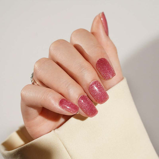Beautiful floral nail art design on hand featuring MoYou London gel nail strips