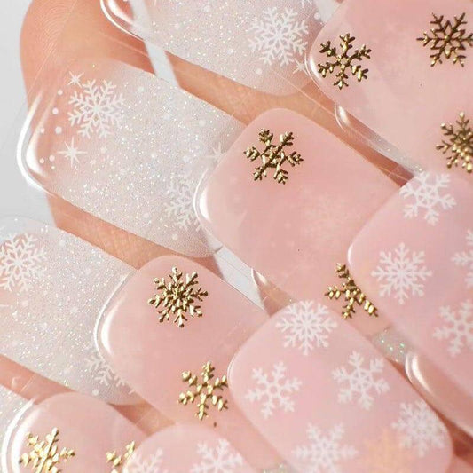 Colourful gel nail strips manicured being cured under UV/LED lamp