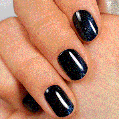 dark blue glitter manicure using gel polish stickers 