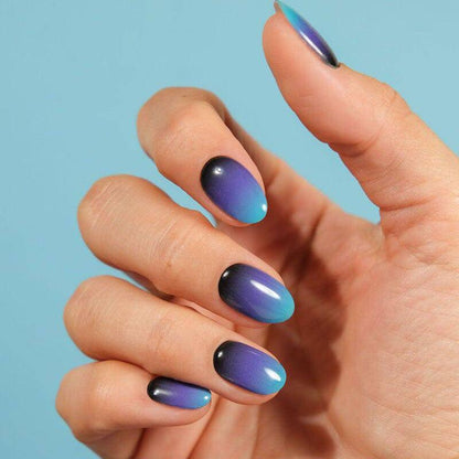 blue gradient manicure using gel polish stickers for strong and healthy nails 
