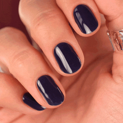 dark purple glossy gel polish manicure using gel stickers 