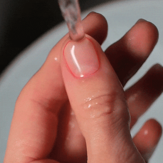 cuticle oil applied on gel stickers for easy removal 