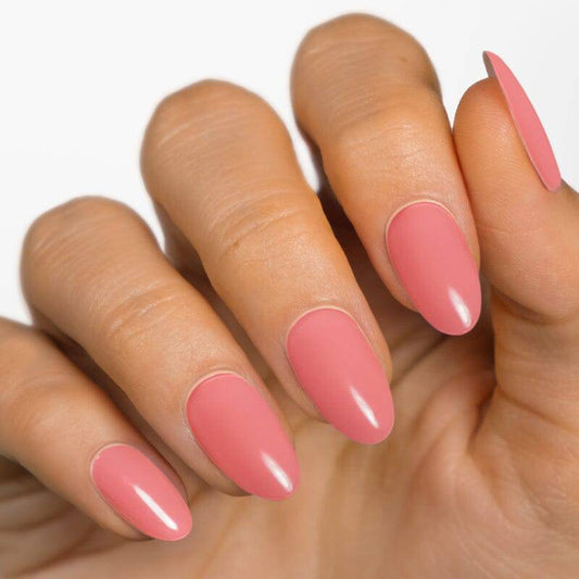 Soft pink glossy almond-shaped nails