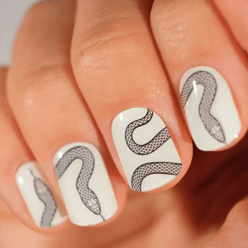snake over white manicure nail artist Peachy nails manicure using gel polish stickers for strong nails 