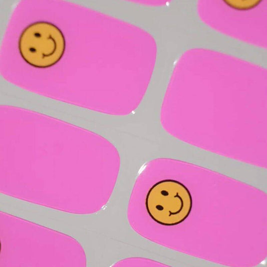 nail sticker made from real gel polish pink colour and yellow smiles 