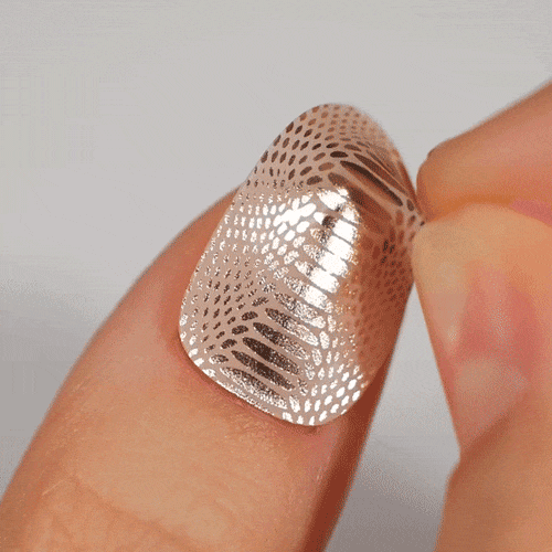 snake silver glossy manicure using a gel polish sticker with easy application 