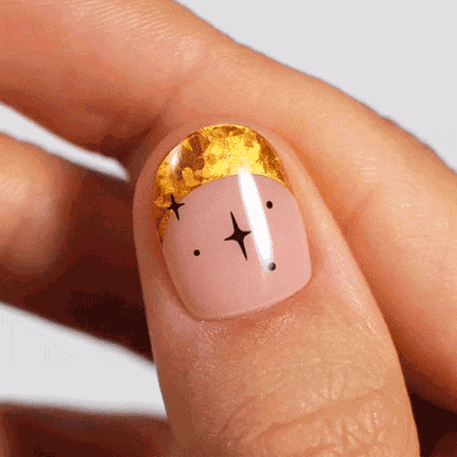 French manicure gel sticker design with black start and gold tips
