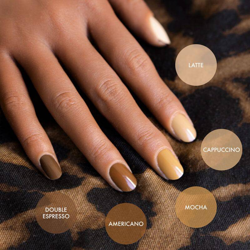 Dark skin colour hand wearing different shades of nude colours gel strip on the nails
